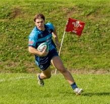 Harrison Burke scores one of his three tries. Picture Myrrdin Dennis